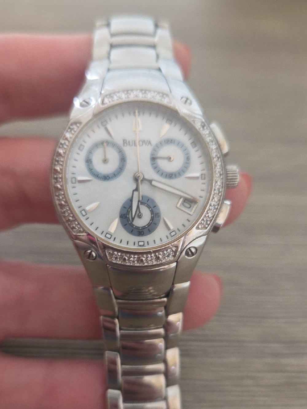 Bulova Women's Silver and White Chronograph with Blue Accents